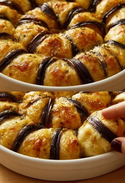 Deliziosi Rotolini di Melanzane ripieni di formaggio e spezie.